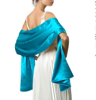 Elegant turquoise satin evening shrug for women over white dress