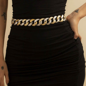 gold and silver chain waist belt body jewelry on black dress summer fashion accessory