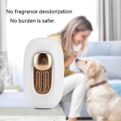 White USB-powered pet refrigerator deodoriser with sterilization function and no fragrance, placed on a table with a woman and dog blurred in the background