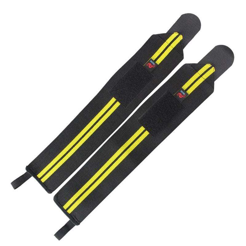 Black and yellow power wrist wraps with Velcro and thumb loops for weightlifting and gym support