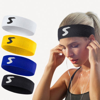 Fitness headbands in white, yellow, blue, and black cotton, shown worn by a woman during exercise