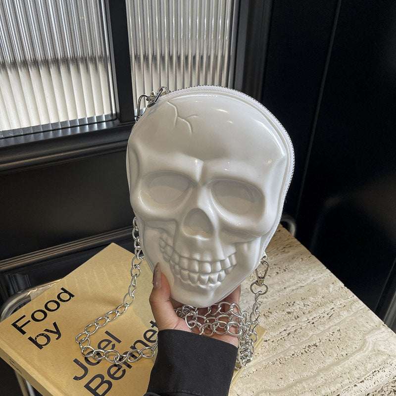 White silicone women's fashion chain bag shaped like a skull with single silver chain strap