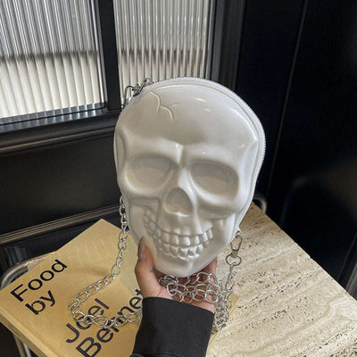 White silicone women's fashion chain bag shaped like a skull with single silver chain strap