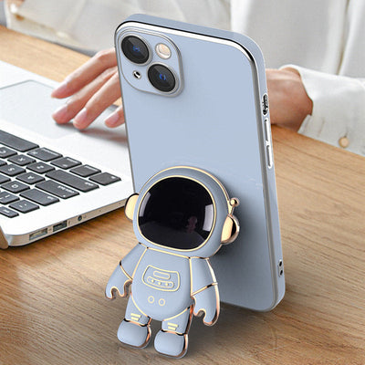 3D astronaut cartoon TPU phone case with electroplating bracket for iPhone models in light cyan color