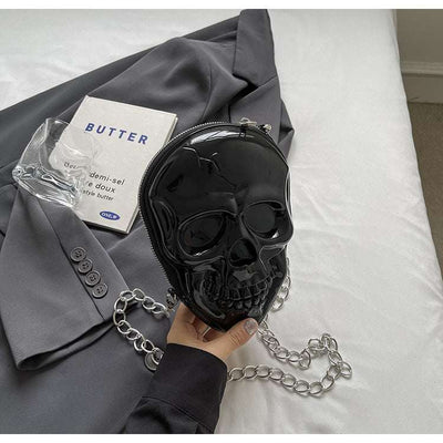 Black silicone women's fashion chain bag in skull shape with single shoulder strap, soft material, stylish crossbody design