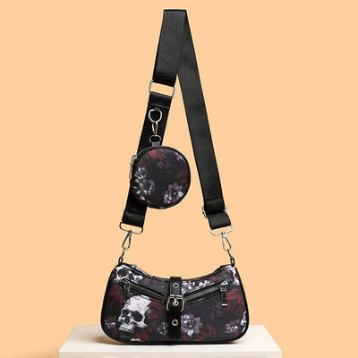 Black floral and skull print fashion crossbody bag with oval shape and detachable round coin pouch