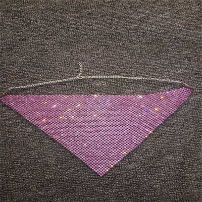 pink rhinestone metal necklace on gray background unisex jewelry accessory