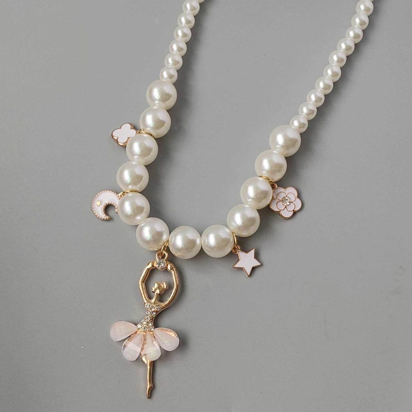 Children's Korean style pearl necklace with ballerina and star charms in white and pink colors