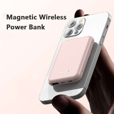 Mini fast charging magnetic wireless power bank 5000mAh portable attached to smartphone in pink color