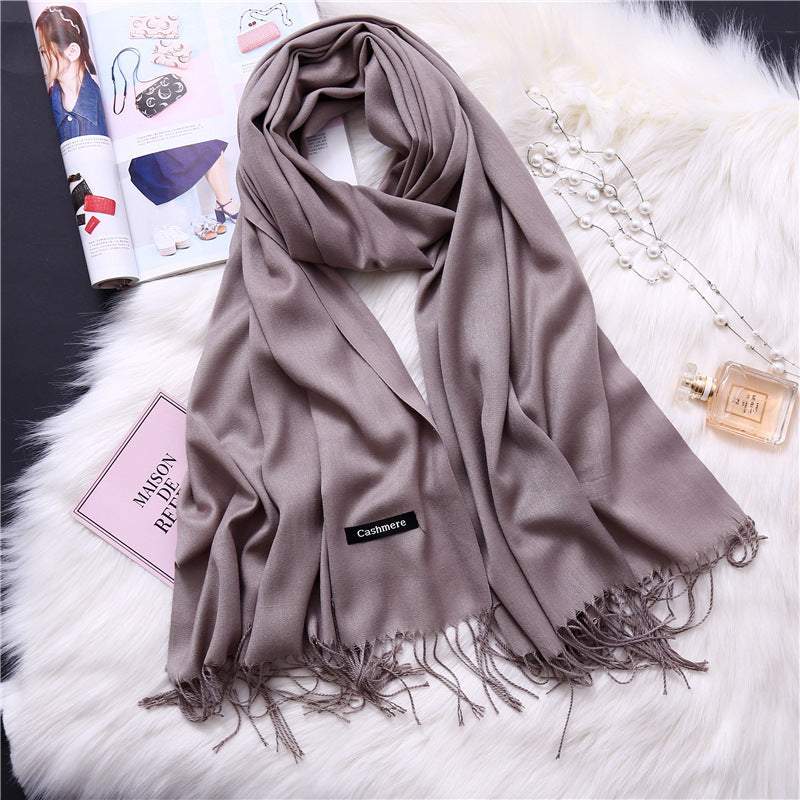 Soft multi-color cashmere women scarf shawl with fringes on white fur background