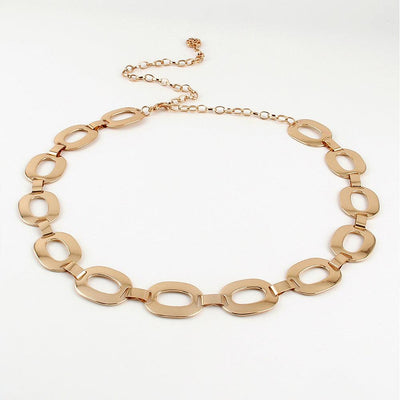 Gold-toned hollow out metal waist chain with linked oval shapes for summer jewelry fashion